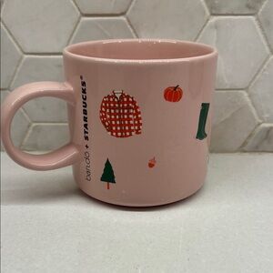 Starbucks Pink Ceramic Mug with Festive Green and Orange Accents